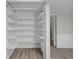 Functional built-in shelving offers ample storage in this organized room at 1310 California St, Columbus, IN 47201