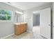 Bright bathroom with single sink vanity and natural light at 13355 Freenza Ct, Carmel, IN 46074
