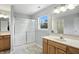 Bright bathroom with double sink vanity and walk-in shower at 13355 Freenza Ct, Carmel, IN 46074