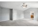 Spacious primary bedroom with neutral walls and ceiling fan at 13355 Freenza Ct, Carmel, IN 46074