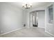 Dining room with neutral walls, carpet and access to other rooms at 13355 Freenza Ct, Carmel, IN 46074