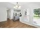 Bright kitchen with stainless steel appliances and eat in bar, with an adjacent dining area at 13355 Freenza Ct, Carmel, IN 46074