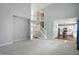Open-concept living space with stairs to the second floor, and kitchen access at 13355 Freenza Ct, Carmel, IN 46074