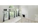 Aerial view of a bright living room with fireplace, and plenty of windows at 13355 Freenza Ct, Carmel, IN 46074