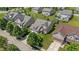 Aerial view of the property with mature trees and landscaping in a residential neighborhood at 13992 Wynngate Ln, Fishers, IN 46038