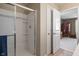 Bright bathroom features a glass shower with neutral tiling at 13992 Wynngate Ln, Fishers, IN 46038
