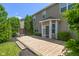 Wooden deck, perfect for outdoor seating, in a well-maintained backyard at 13992 Wynngate Ln, Fishers, IN 46038