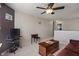 Comfortable loft with plush sofa, vintage furnishings, and a view of the upper level at 13992 Wynngate Ln, Fishers, IN 46038