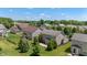 Aerial view of a two-story home boasting a well-manicured lawn and landscaping, creating a serene outdoor space at 13992 Wynngate Ln, Fishers, IN 46038