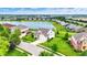 Panoramic aerial view capturing the property's prime location with a scenic lake, lush landscaping, and desirable neighborhood at 14682 Braemar E Ave, Noblesville, IN 46062