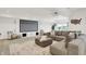 Inviting living room features a large screen and a spacious seating arrangement, perfect for movie nights at 14682 Braemar E Ave, Noblesville, IN 46062