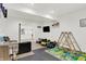 Fun playroom with a variety of toys and colorful decor, ideal for ' entertainment at 14682 Braemar E Ave, Noblesville, IN 46062