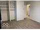 Bedroom featuring built in closet organizer and neutral colored carpet at , Lebanon, IN 46052