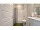 Bright bathroom featuring a shower-tub combo, white cabinets, and a white shower curtain at 17303 Lillian St, Westfield, IN 46074