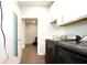 Well-equipped laundry room features modern appliances, ample counter space, and direct access to other areas at 17303 Lillian St, Westfield, IN 46074