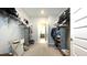 Spacious walk-in closet with ample shelving and hanging space, offering efficient storage solutions and view to a bedroom at 17303 Lillian St, Westfield, IN 46074