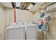 Basement laundry area with new Samsung washer and dryer, plus wire rack at 1739 Caldwell Pl, Columbus, IN 47201