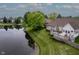 An aerial perspective of backyard featuring a deck, and view of a beautiful pond at 18432 Oriental Oak Ct, Noblesville, IN 46062