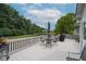 Inviting outdoor deck with a table set and an umbrella, ideal for outdoor dining at 18432 Oriental Oak Ct, Noblesville, IN 46062