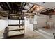 Storage area in the basement features a rack and appliances at 23 S Downey Ave, Indianapolis, IN 46219