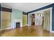 Spacious living room with fireplace and built-in shelving, perfect for entertaining at 23 S Downey Ave, Indianapolis, IN 46219