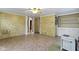 Open floor plan living room includes lots of room and faux fireplace at 23 S Downey Ave, Indianapolis, IN 46219