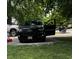 Spacious driveway with a black SUV and ample parking at 241 Deborah Ln, Whiteland, IN 46184