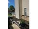 Exterior view of the home's siding with a window and meticulously maintained flowerbeds at 241 Deborah Ln, Whiteland, IN 46184