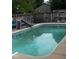 Backyard swimming pool with slide and fenced-in yard at 241 Deborah Ln, Whiteland, IN 46184
