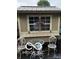 Charming shed with outdoor seating and decorative details for backyard appeal at 241 Deborah Ln, Whiteland, IN 46184