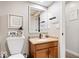 Cozy powder room featuring a toilet and single vanity sink at 259 Glenbrook Ln, Avon, IN 46123