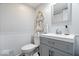 Charming bathroom with decorative wall art, updated vanity, and neutral color palette at 259 Glenbrook Ln, Avon, IN 46123