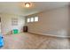 Spacious basement with carpet flooring, neutral walls, and ample room for activities at 2615 Pumpkin Patch Ln, Indianapolis, IN 46229