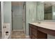 Well-lit bathroom with a shower, vanity, and neutral-toned walls at 2615 Pumpkin Patch Ln, Indianapolis, IN 46229
