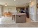 Modern kitchen boasts an island, ample counter space, and sleek appliances at 2615 Pumpkin Patch Ln, Indianapolis, IN 46229