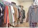 Functional walk-in closet featuring ample storage space with shelving and hanging racks at 2615 Pumpkin Patch Ln, Indianapolis, IN 46229