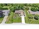 Beautiful aerial view of a home with manicured lawn, landscaping, and inviting curb appeal at 272 N Peterman Rd, Greenwood, IN 46142
