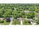 Serene aerial view of a lush neighborhood with mature trees and well-maintained homes at 272 N Peterman Rd, Greenwood, IN 46142