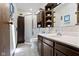 Bathroom with white sink and vanity, walk-in shower, dark wood storage cabinet and toilet at 272 N Peterman Rd, Greenwood, IN 46142