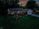 Beautifully landscaped one story home with manicured lawn and attached garage at 272 N Peterman Rd, Greenwood, IN 46142