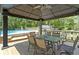 Backyard gazebo with a dining table set and clear view of the backyard and swimming pool at 272 N Peterman Rd, Greenwood, IN 46142