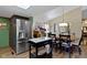 Spacious eat-in kitchen featuring stainless steel refrigerator and granite topped island at 272 N Peterman Rd, Greenwood, IN 46142