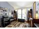 Cozy living space with natural light, display shelves, and eclectic design at 272 N Peterman Rd, Greenwood, IN 46142