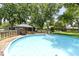 An in-ground pool and backyard gazebo provide the perfect place to relax and entertain guests at 272 N Peterman Rd, Greenwood, IN 46142