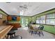 Large recreation room with wood trim, natural light, wet bar, and pool table at 272 N Peterman Rd, Greenwood, IN 46142
