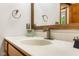 Modern bathroom vanity with neutral tones, stainless faucet and towel bar at 2872 N Prairie Stream Way, Columbus, IN 47203