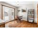 Cozy breakfast nook with wood floors and patio door access to backyard at 2872 N Prairie Stream Way, Columbus, IN 47203