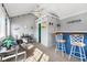 Cozy living area featuring nautical decor, a bar, and casual seating perfect for relaxation and entertainment at 2872 N Prairie Stream Way, Columbus, IN 47203