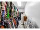 Bright walk-in closet providing ample space for clothing and accessories, enhancing storage and convenience at 2872 N Prairie Stream Way, Columbus, IN 47203