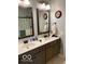 Double sink bathroom featuring large mirrors and neutral paint at 3354 Nottinghill Dr, Plainfield, IN 46168